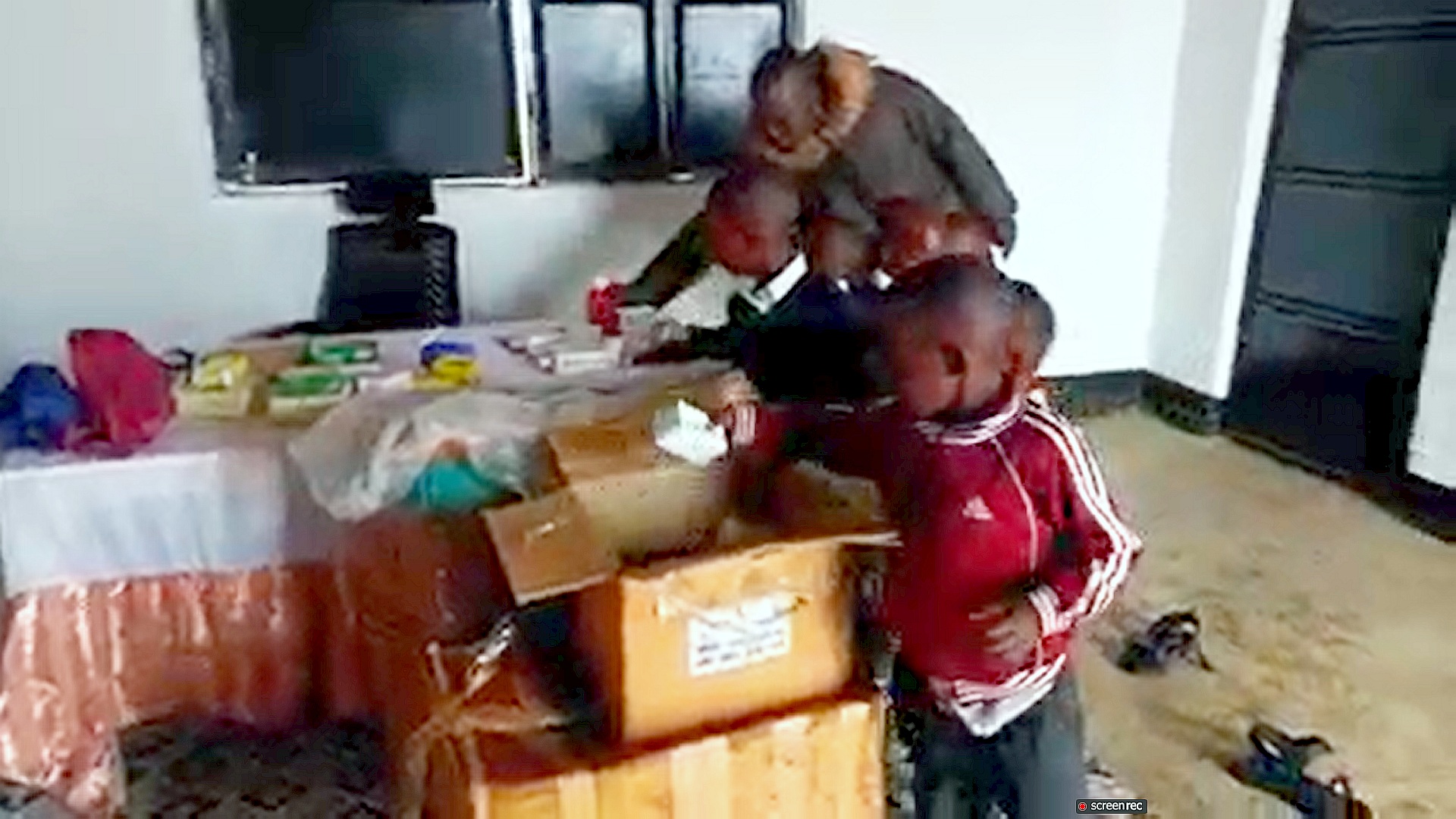 kids unpacking medicines